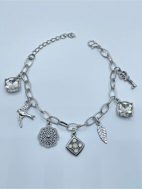 Silver Tone Crystal Charm Bracelet Bird Key Leaf Dangle Statement